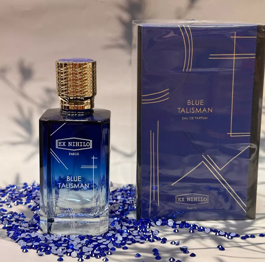 Флакон Blue Talisman рядом с коробкой